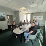 Employees collaborating at a meeting room